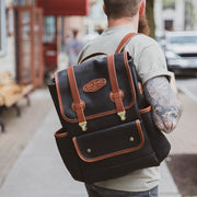 Black and brown leather backpack