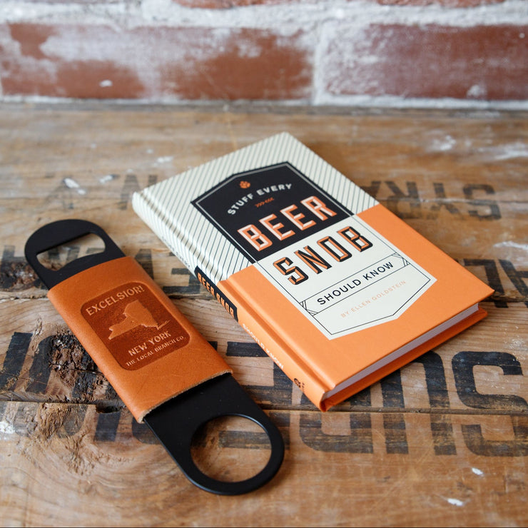 Beer bottle opener and book titled &