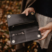 Open detail of leather pocketbook in black with zipper and card slots made by The Local Branch