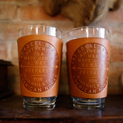 Always prepared for road rail and trail stamped leather pint glass sleeve 