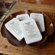 Dish of incense tins