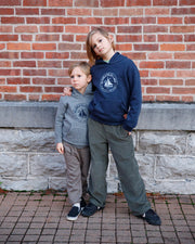 The Skaneateles Hard to Say Easy to Love sweatshirts by The Local Branch worn by two kids