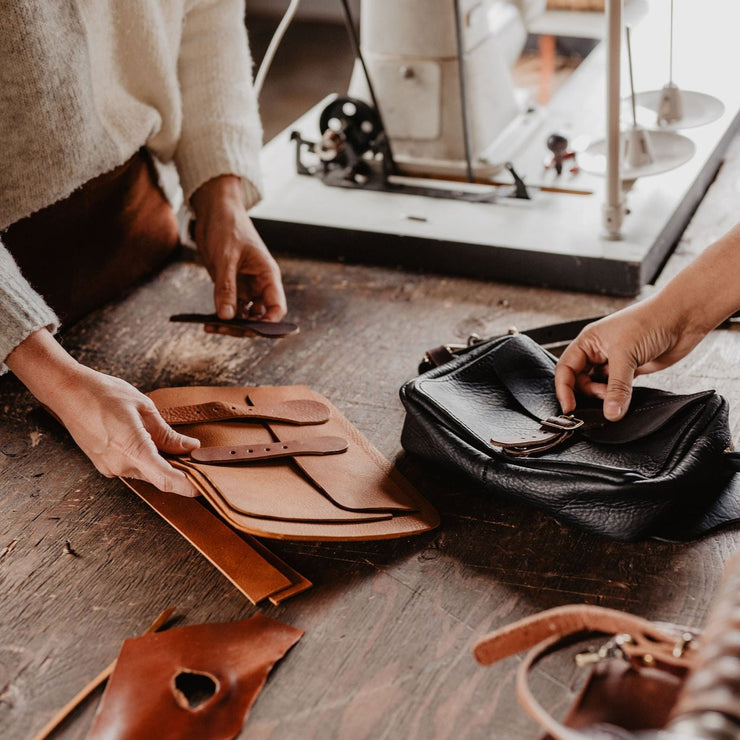 Construction of sling pack bag in The Local Branch workshop