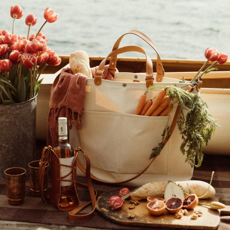 The Mariner Boat tote styled at the lake with a picnic and tulips 