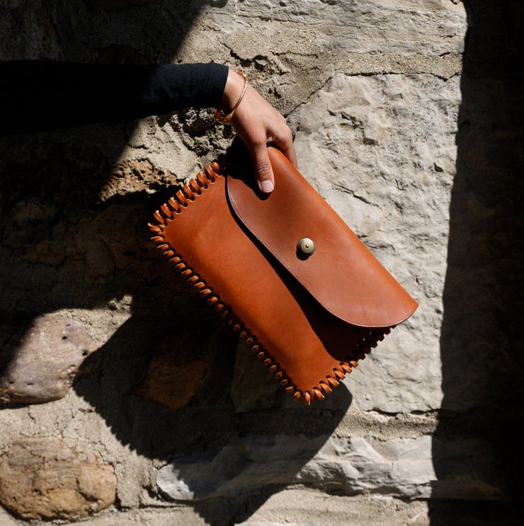 caramel hand laced sides locking snap closure gaucho clutch USA made by the local branch