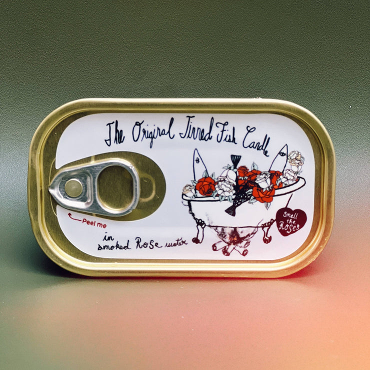 candle in a sardine tin with scent of rose