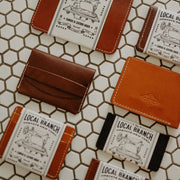 Variety of wallets packaged by The Local Branch