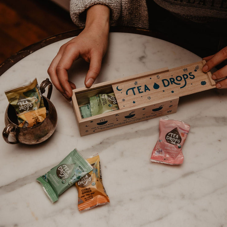 wooden box with individually wrapped tea drops