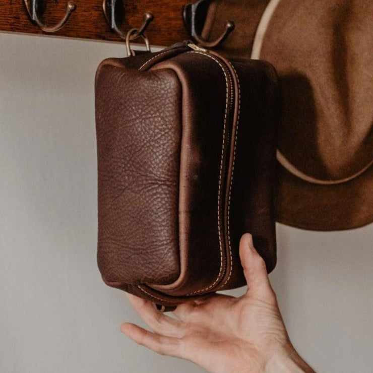 Leather Dopp Toiletry Kit - The Local Branch hung on a hook